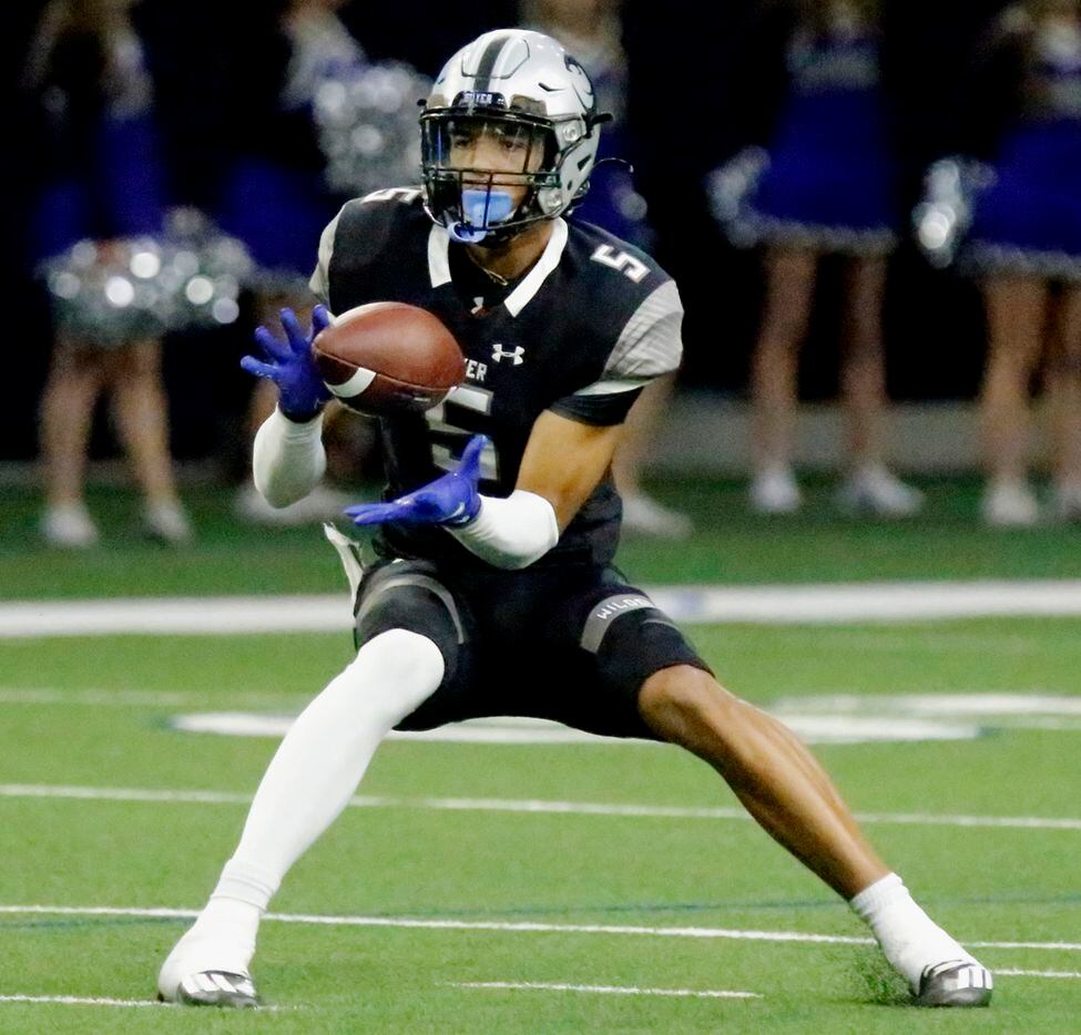 Guyer High School wide receiver Jace Wilson (5) makes a catch during the first half as Denton Guyer High School played Trophy Club Byron Nelson High School in a Class 6A Division II Region I semifinal football game at The Ford Center in Frisco on Saturday, November 27, 2021. (Stewart F. House/Special Contributor)