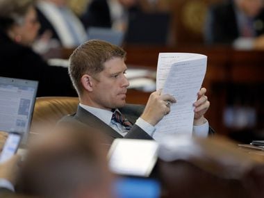 Rep. Matt Krause, R-Fort Worth, looked over the calendar as lawmakers rushed to finish business on Friday.