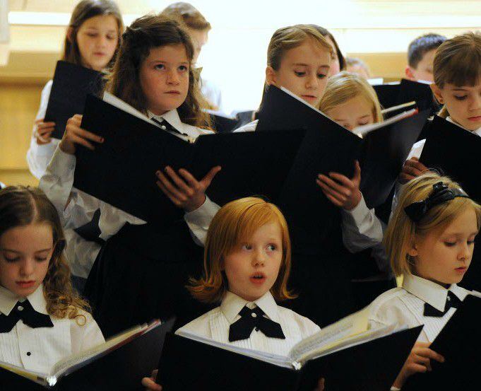 Church youth choir performs Christmas music.