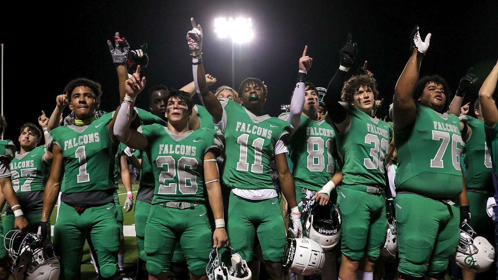 The Lake Dallas Falcons celebrate a victory over Denton, 31-14 to make the playoffs in a...