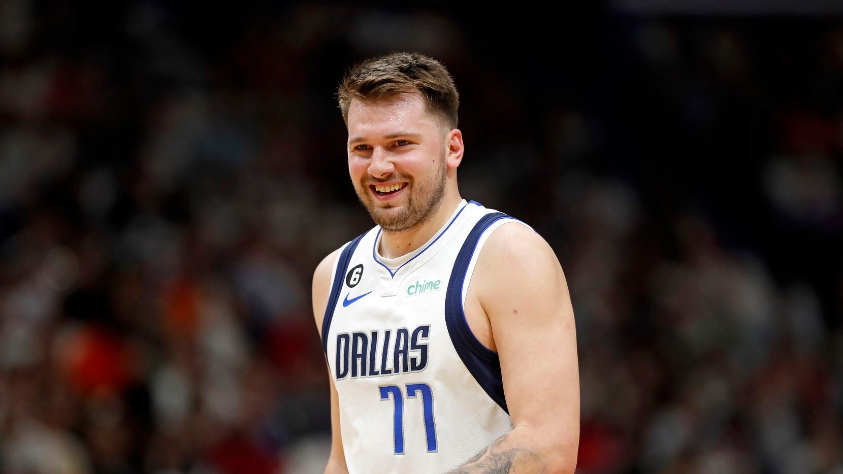 Dallas Mavericks guard Luka Doncic (77) reacts to a call in the first half of an NBA...