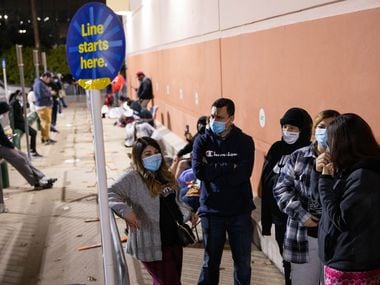 From left: Lourdes Alvarez, Eddie Zubiri, DJ Rios, Leizet Zubiri and Karissa Flores wait at the front of the line at Best Buy on North Central Expressway during Black Friday in Dallas. They got in line at 2:30 a.m. for the store to open at 5 a.m. but walked out empty-handed after finding out the Insignia television they came for was out of stock.