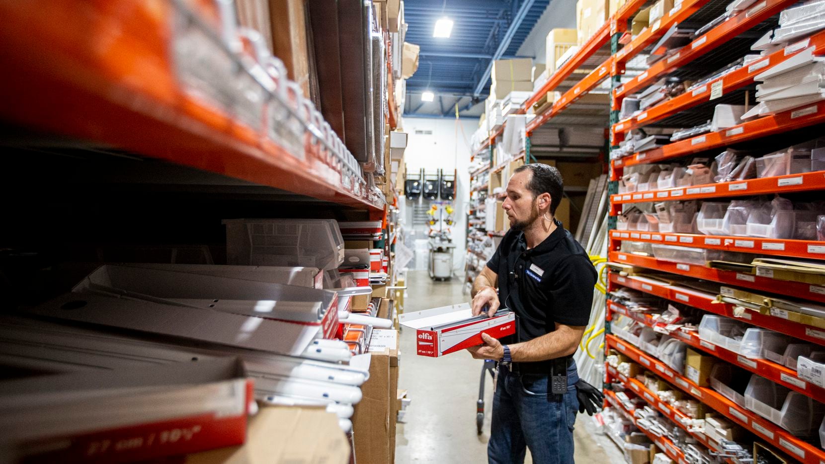 Jason Burchfield, an employee with The Container Store, worked in the stockroom at a store...