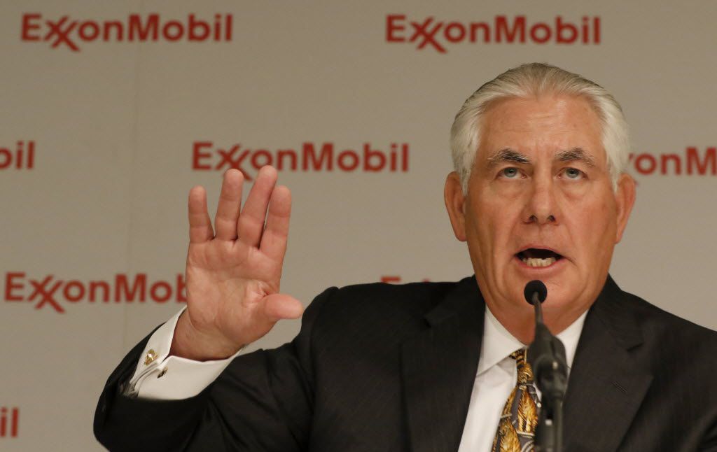 Exxon Mobil Chairman and CEO Rex Tillerson answers questions during a press conference after...