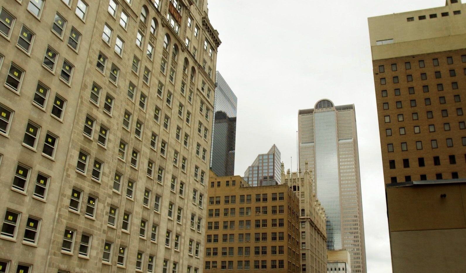 The Davis Building (left) on Main Street in downtown Dallas, is one of the state's largest...