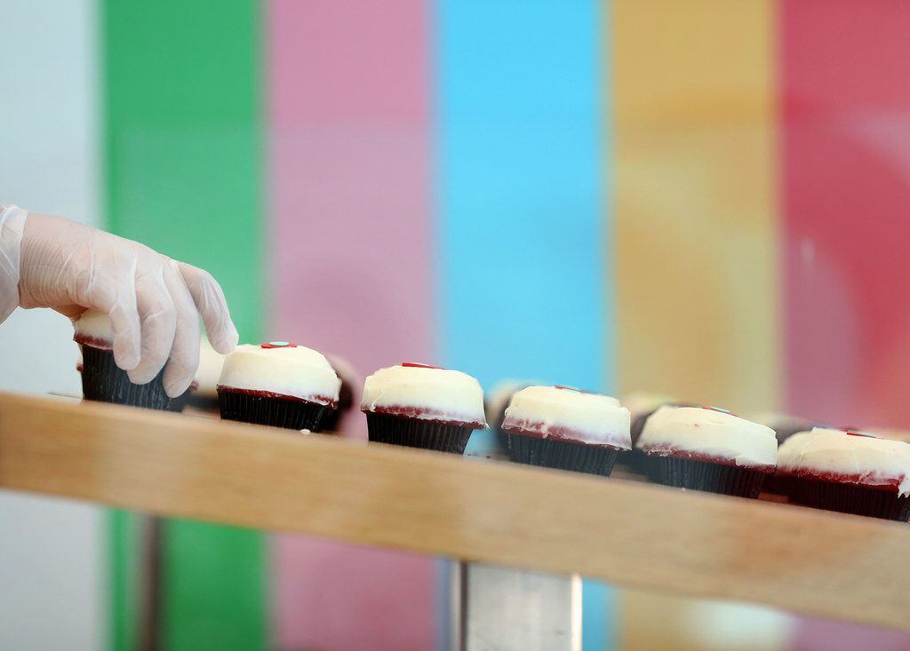 Red velvet cupcakes are set out at Sprinkles Cupcakes at Legacy West.