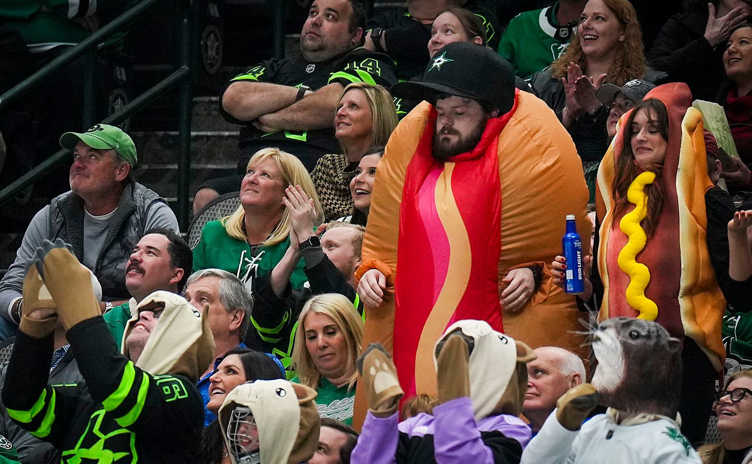 Dallas Stars fans wear Halloween costumes during the second period of an NHL hockey game...