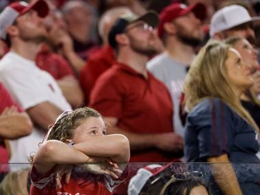 Arkansas fans watches the downfall of the team against Texas A&M during the second half of a...