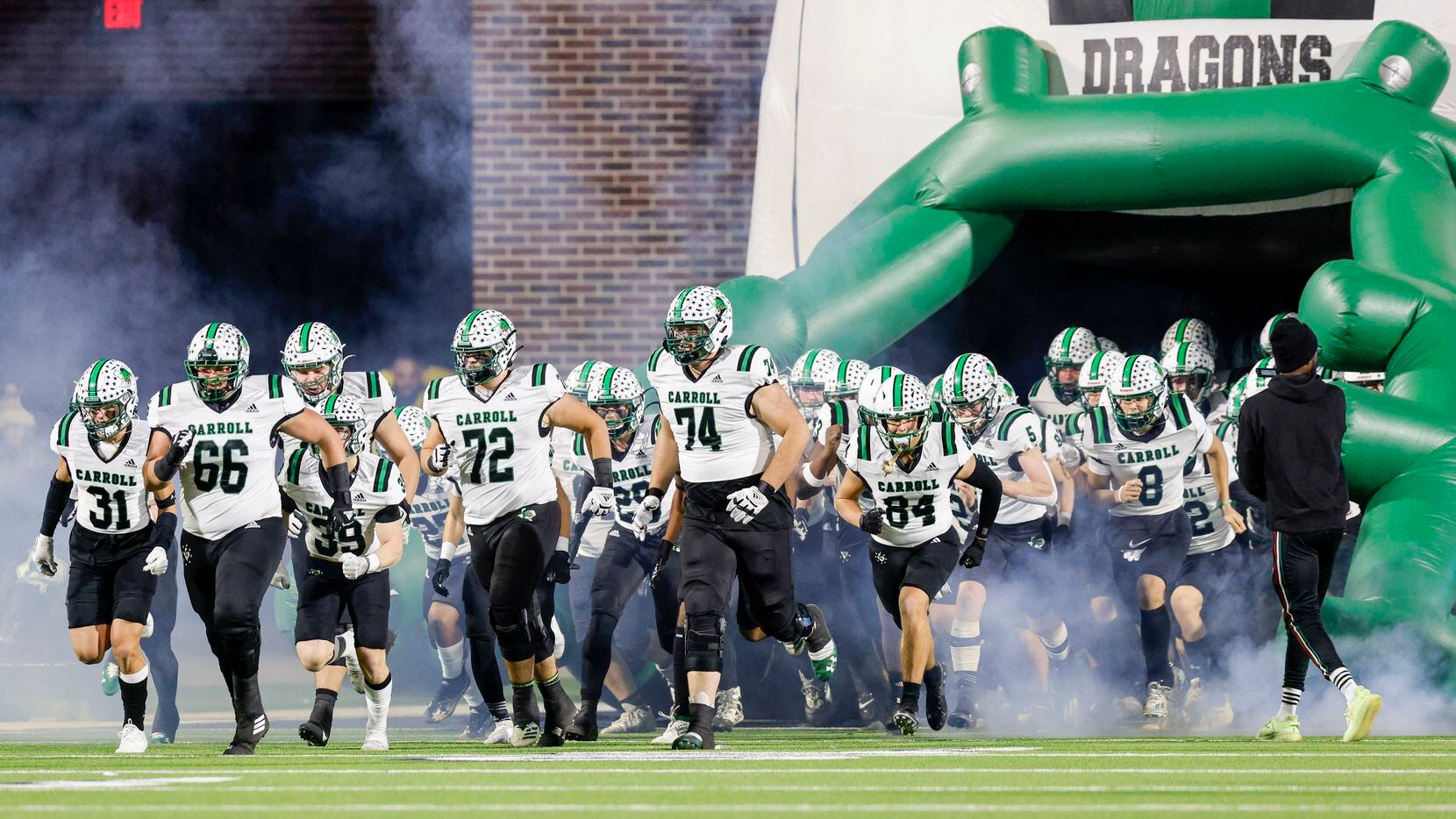 Southlake Carroll takes the field before the second half of their Class 6A Division I state semifinal playoff game at McKinney ISD Stadium in McKinney, Texas, Saturday, Dec. 11, 2021. Duncanville defeated Southlake Carroll 35-9. (Elias Valverde II/The Dallas Morning News)