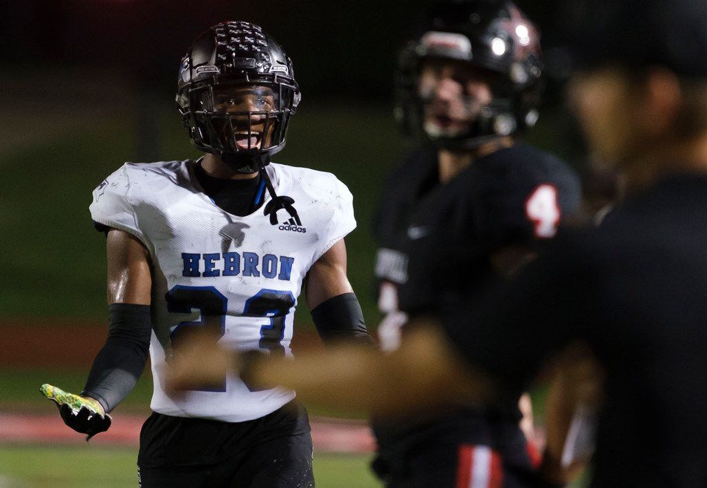 Hebron defensive back Darius Snow (23) motions to the opposing bench during the second half...