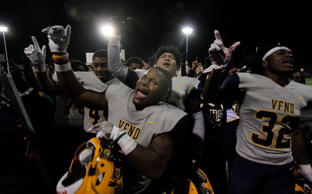 Arlington Lamar linebacker Jayveion Moore (9) lets out a yell as he celebrates with...