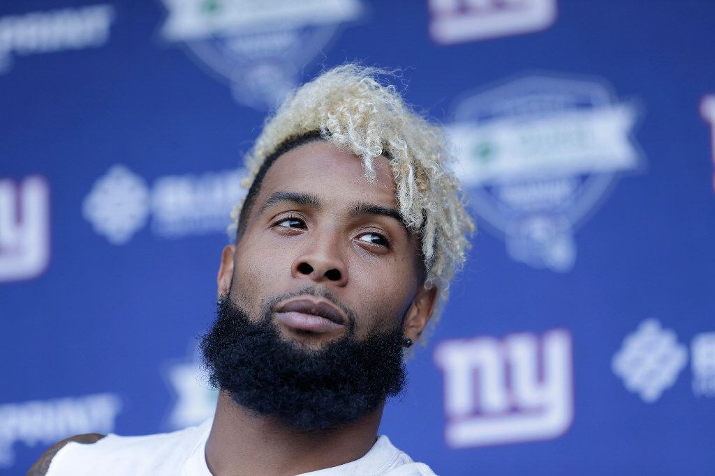 New York Giants' Odell Beckham, Jr. talks to reporters after a NFL football practice in East...