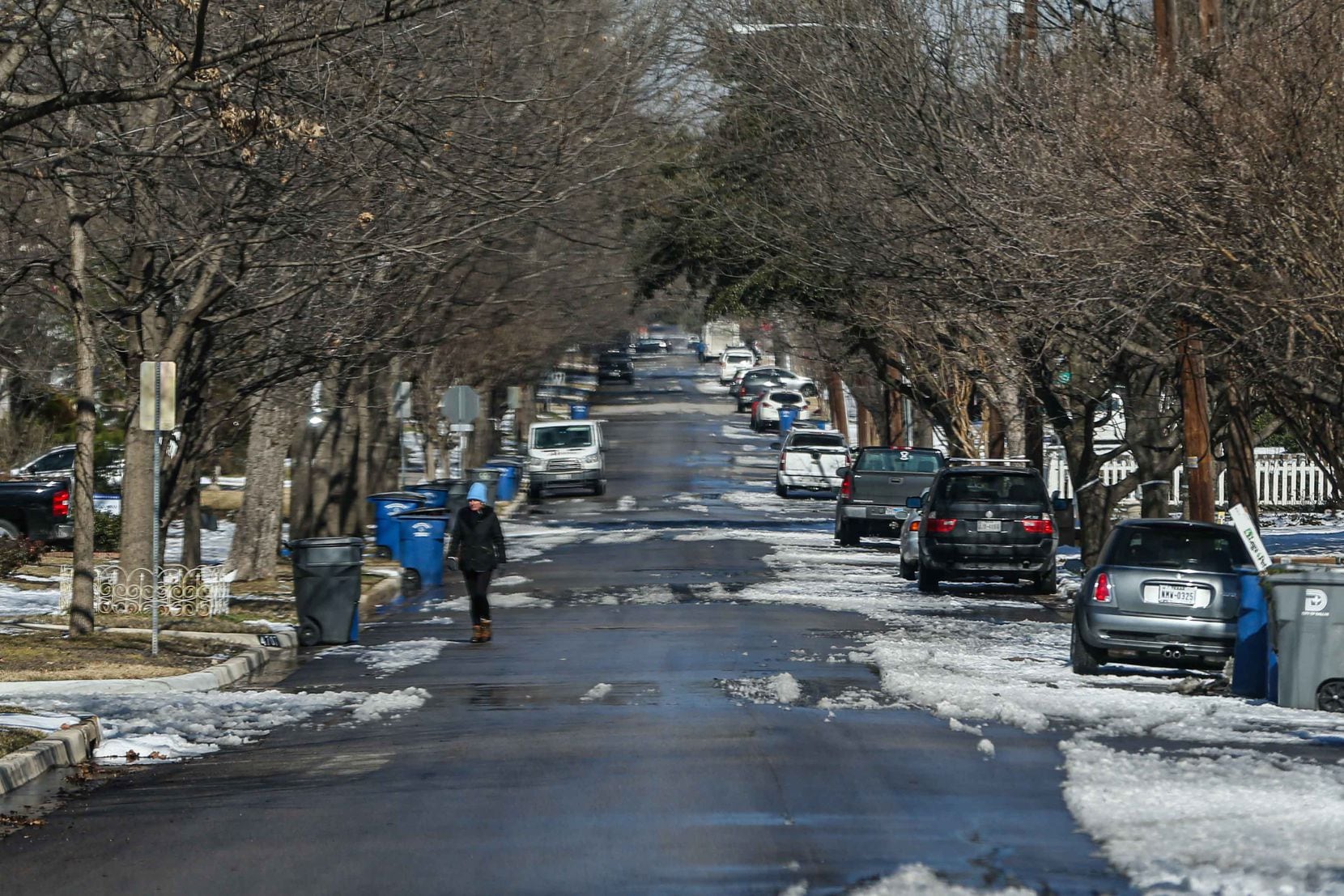 North Texas has begun to thaw out from the week's freezing weather, but trouble such as lingering power outages and boil-water notices remain. Above is a scene from Dallas' Swiss Avenue on Friday, Feb. 19, 2021.