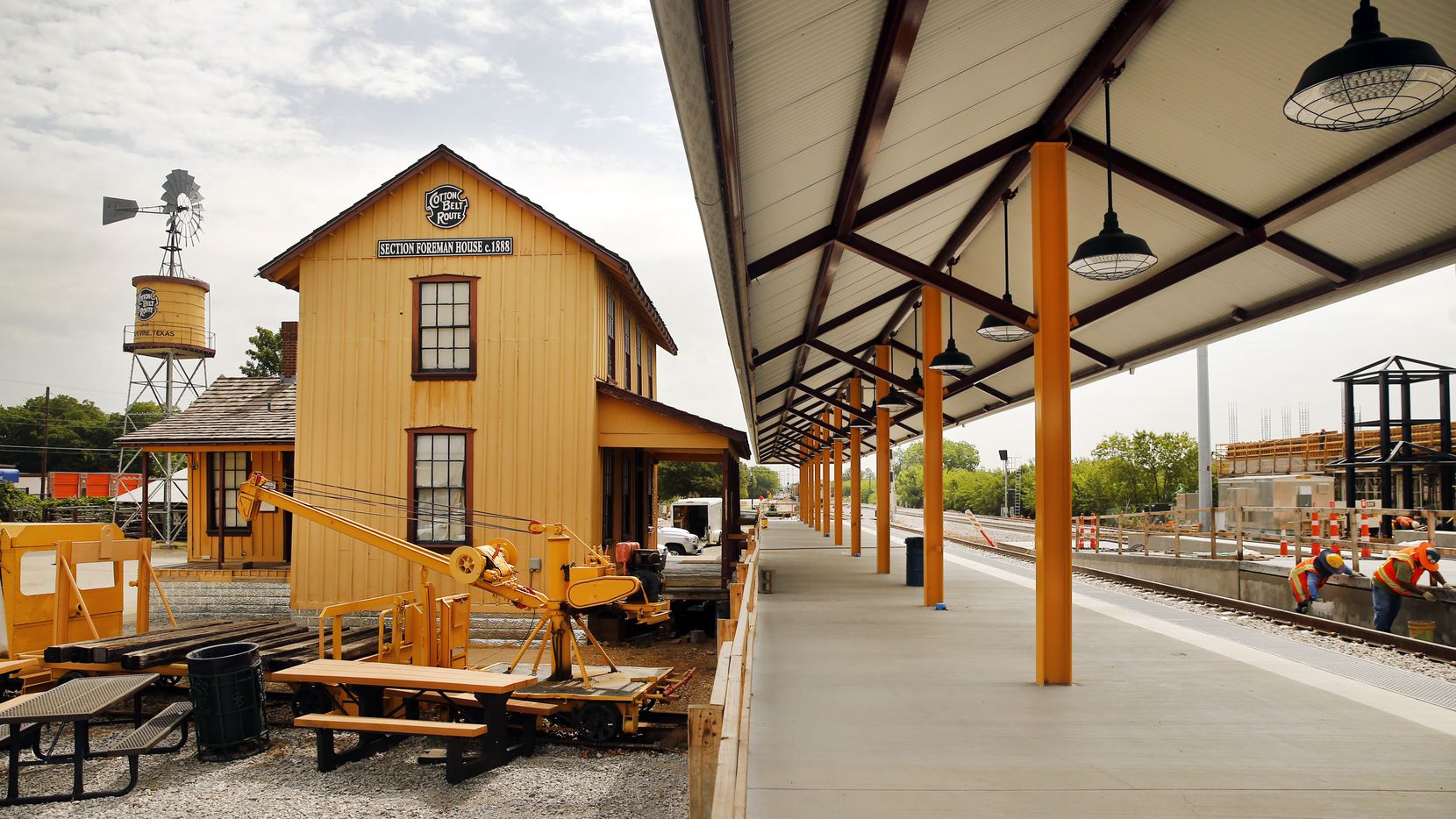 A newly constructed train platform runs adjacent to the historic Grapevine train depot in...