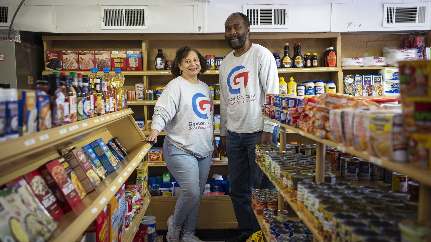 Co-owners Jonnie Gipson and Phillip Gipson stand inside their business Gipson Grocery in Dallas. The small neighborhood grocery store is one of the longest-running Black-owned grocery stores in North Texas and the nation.