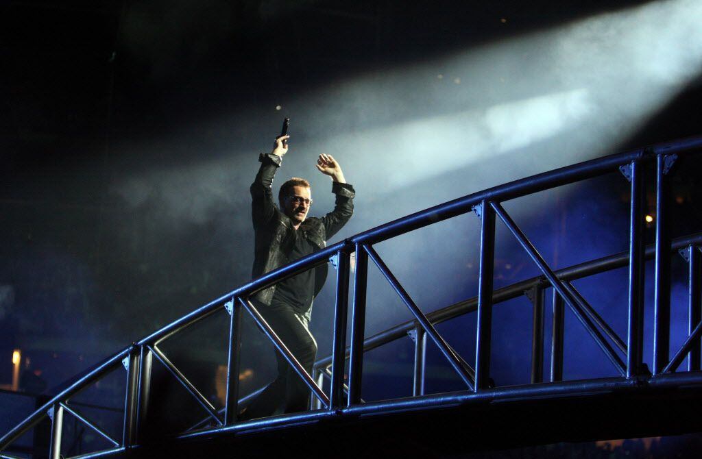 U2's Bono sings at Cowboys Stadium in Arlington on Monday, October 12, 2009.