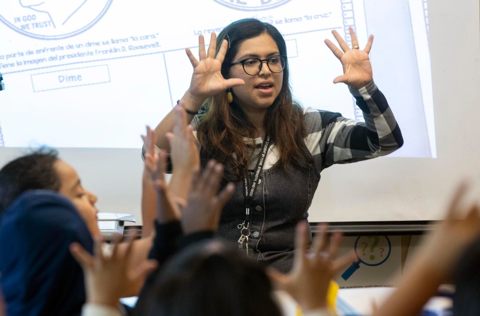 Fatima Nunez Ardon, a teacher in training, works with second graders at Madrona Elementary...