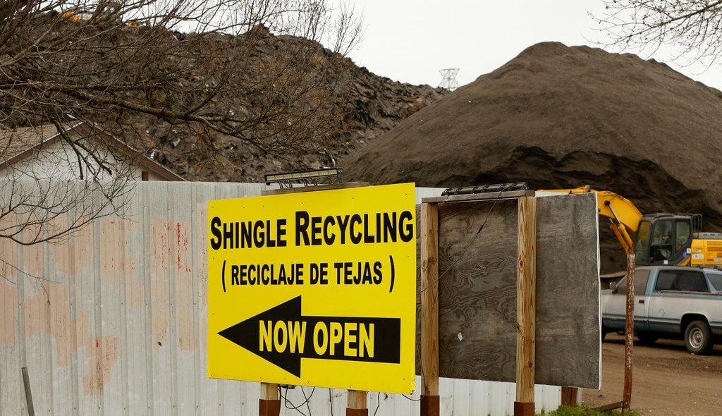 A large hill of recycled shingles is seen at Blue Star Recycling near State Highway 310 and Interstate 20 in southern Dallas.