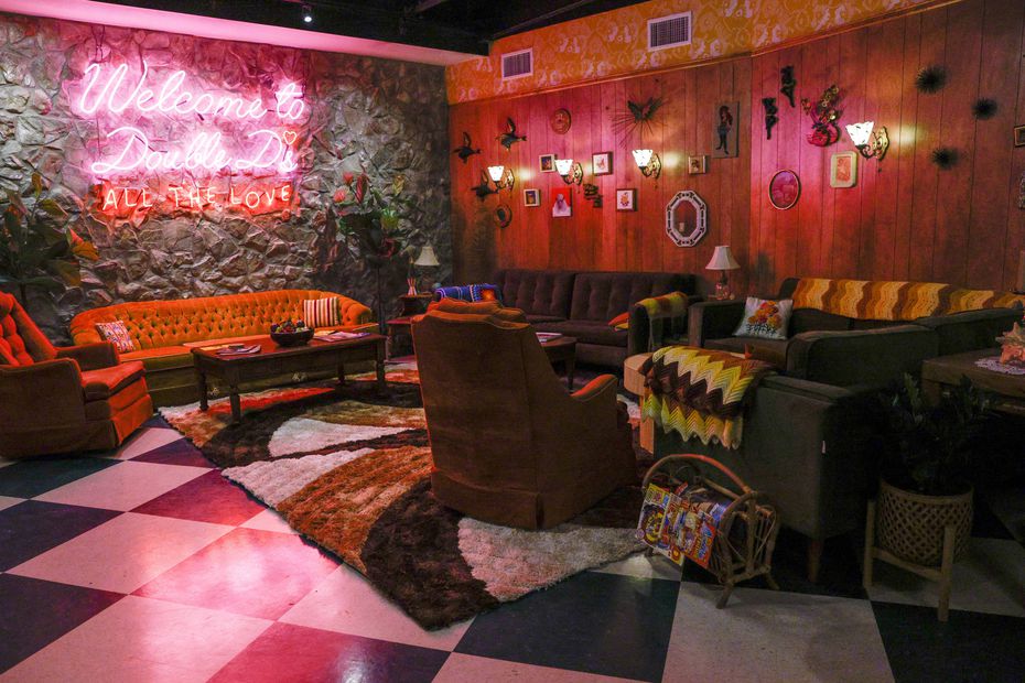 At one end of Double D's bar in Dallas, couches welcome customers ready to get cozy with...