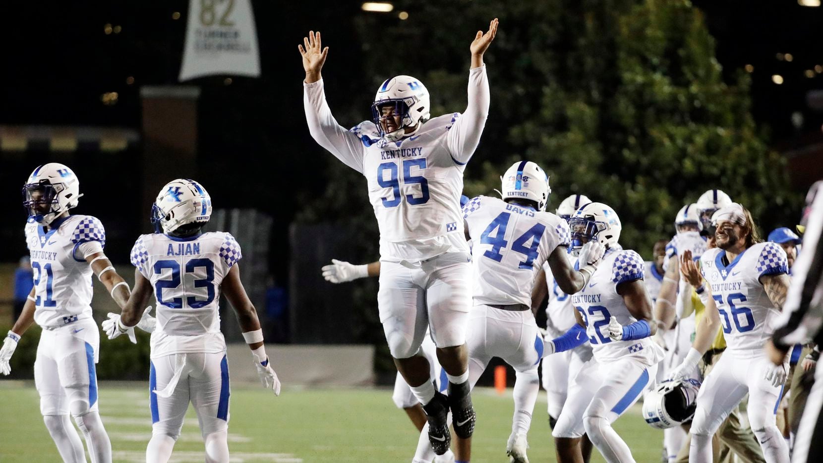 Kentucky nose tackle Quinton Bohanna (95) celebrates after his team stopped a Vanderbilt drive in the fourth quarter of an NCAA college football game Saturday, Nov. 16, 2019, in Nashville, Tenn.