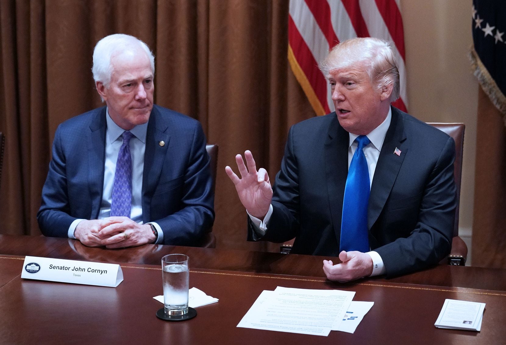 Sen. John Cornyn listens to President Donald Trump during a meeting with bipartisan members of Congress on school and community safety in the Cabinet Room of the White House on February 28, 2018.