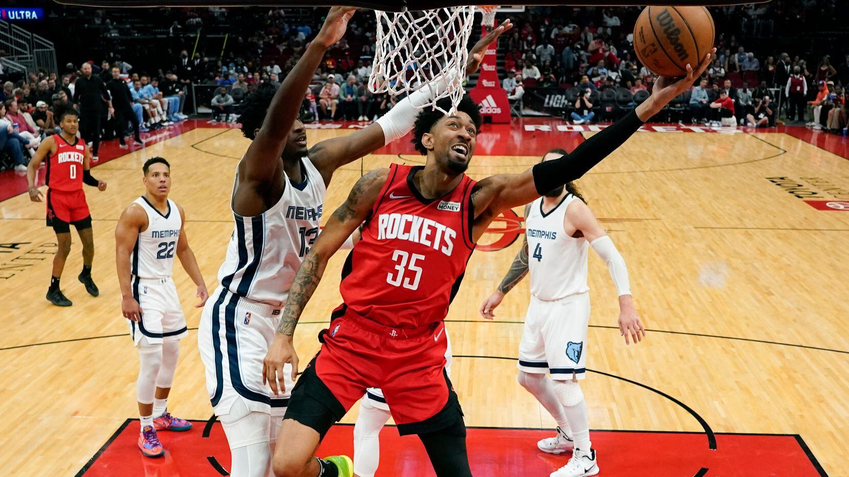 FILE - Houston Rockets center Christian Wood (35) shoots as Memphis Grizzlies forward Jaren...