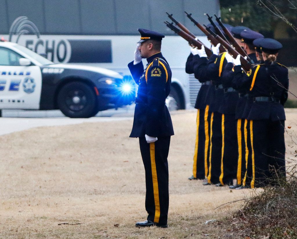 Dallas police officers fired a 21-gun salute for Richardson police Officer David Sherrard...
