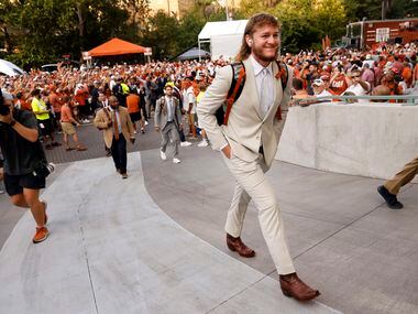 arrives for their game against the Alabama Crimson Tide at Darrell K. Royal-Texas Memorial...