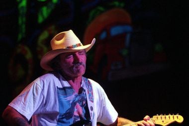 The Allman Brothers Band lead guitarist Dickey Betts plays with the band during their...