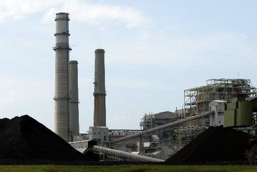 A 2003 file photo of Luminant's Monticello coal-fired power plant near Mount Pleasant. One of the state's largest coal plants is closing in January, forced out of business by cheap natural gas. In recent years, it's only operated only seasonally. 