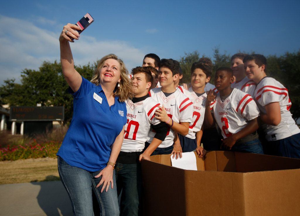 Trisha Cunningham, North Texas Food Bank President and CEO, takes a selfie with John Paul II...
