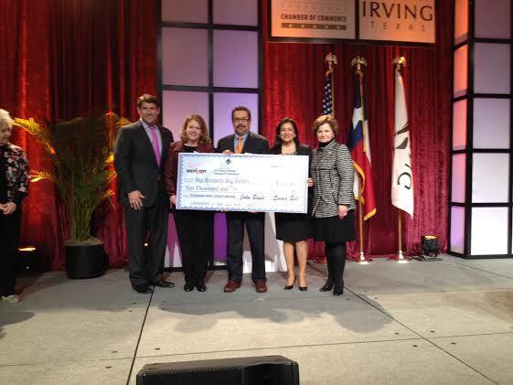 One Irving presents a $10,000 check to Big Brothers Big Sisters at the State of the City...