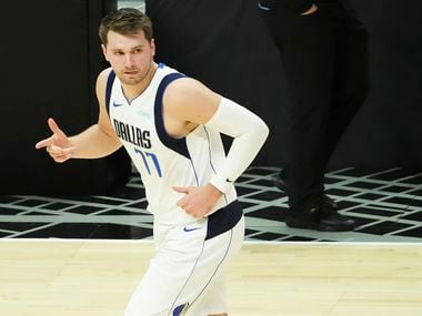 Dallas Mavericks guard Luka Doncic celebrates a 3-pointer during the first quarter of Game 7 of an NBA playoff series against the LA Clippers at the Staples Center on Sunday, June 6, 2021, in Los Angeles. 