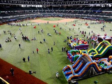 Rangers fans turned out to experience the field as the Rangers Fan Fest was held at Globe...