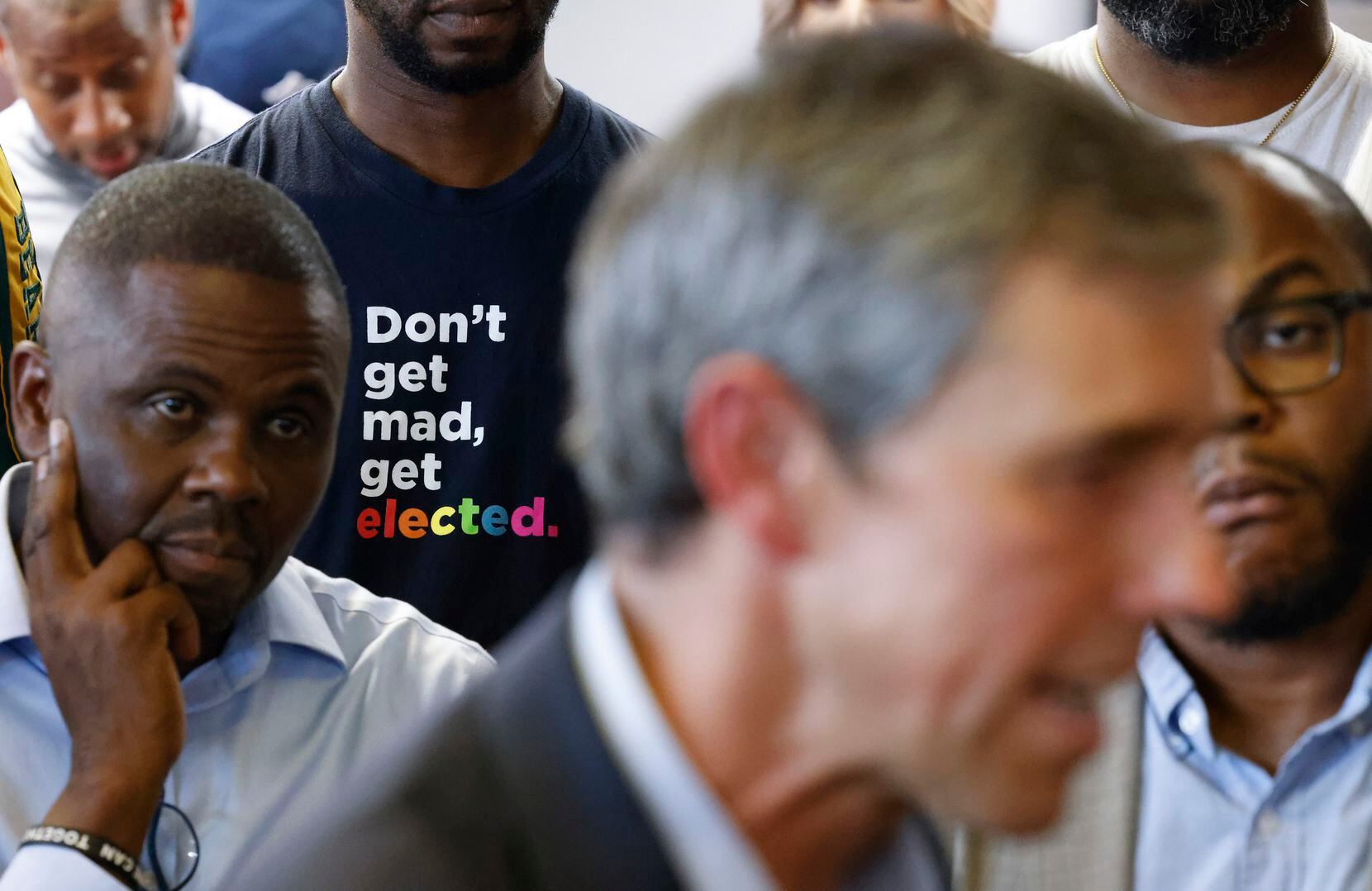A patron wears a shirt reading “don’t get mad, get elected” as Texas Governor candidate Beto...