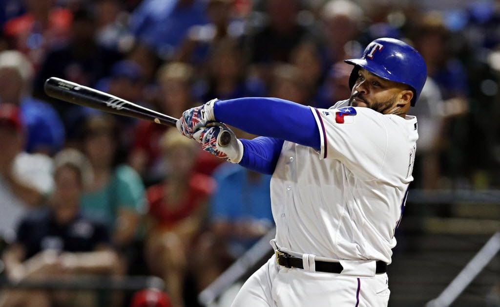 Texas Rangers designated hitter Prince Fielder strikes out during the ninth inning of...