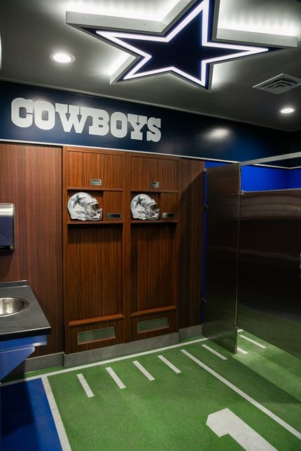 Even the restrooms at the new Raising Cane's in northwest Dallas are Dallas Cowboys themed. 
