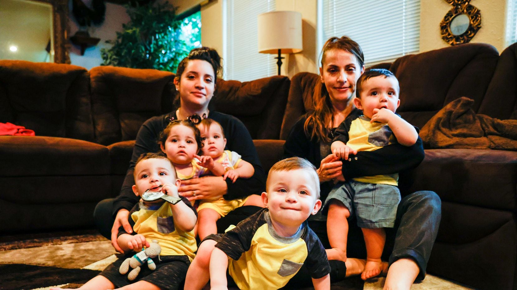 Brenda Raymundo and her mother, Maria Acosta, with the quintuplets: From left, Antonio,...
