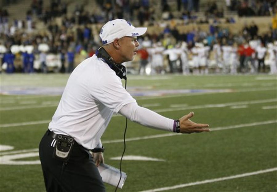 Tulsa head coach Philip Montgomery gestures to an official in the fourth quarter of an NCAA...