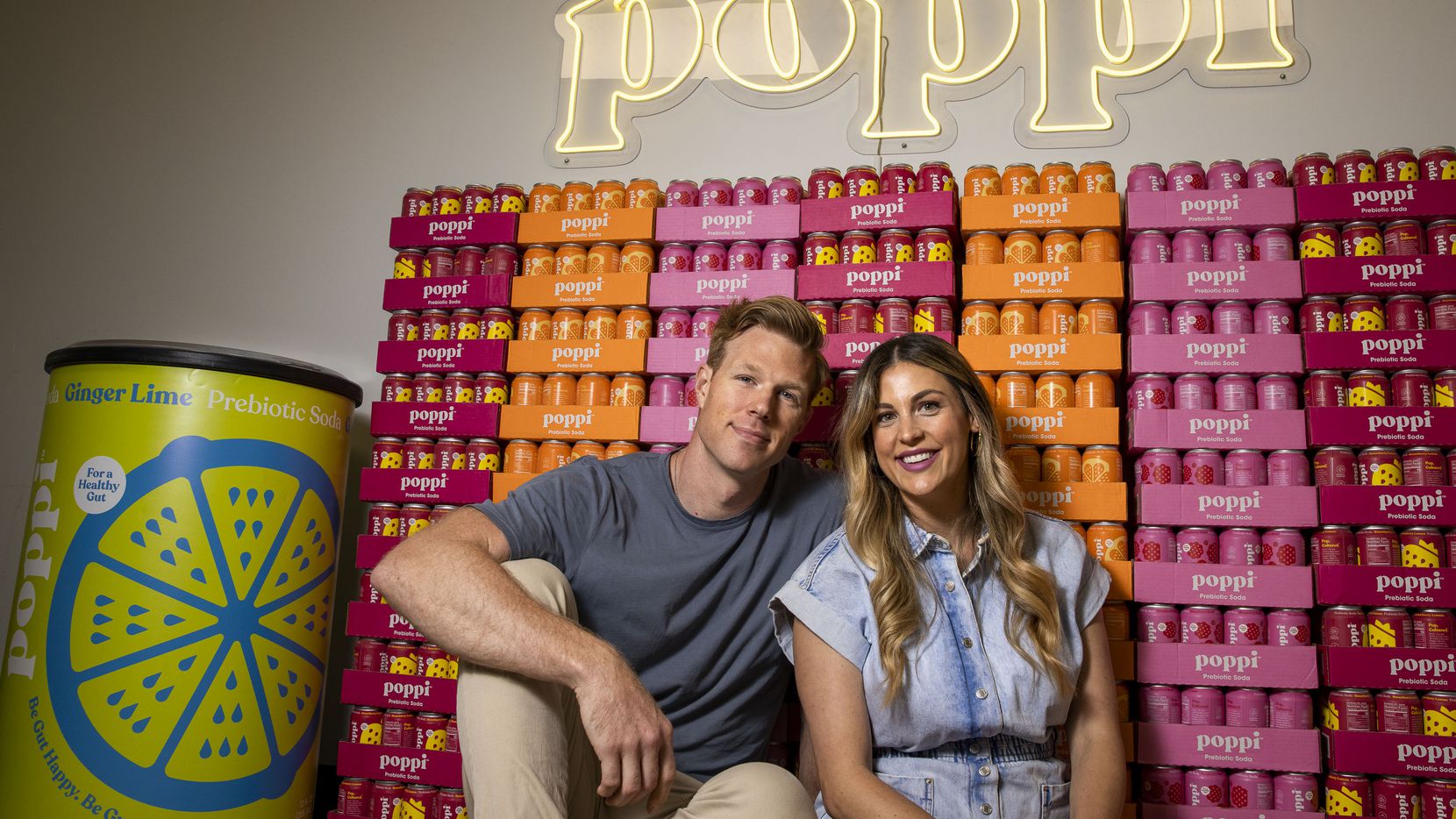 Husband and wife team Stephen and Allison Ellsworth pose for a portrait at the Poppi office...