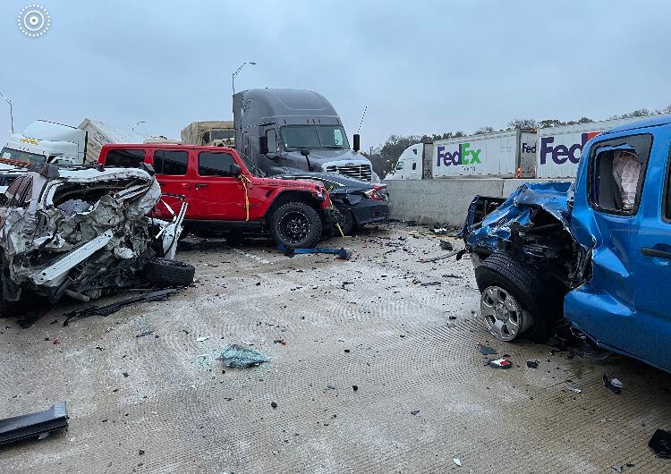 Megan Reynolds took this photo of her red Jeep in the February 2021 smashup on I35W...