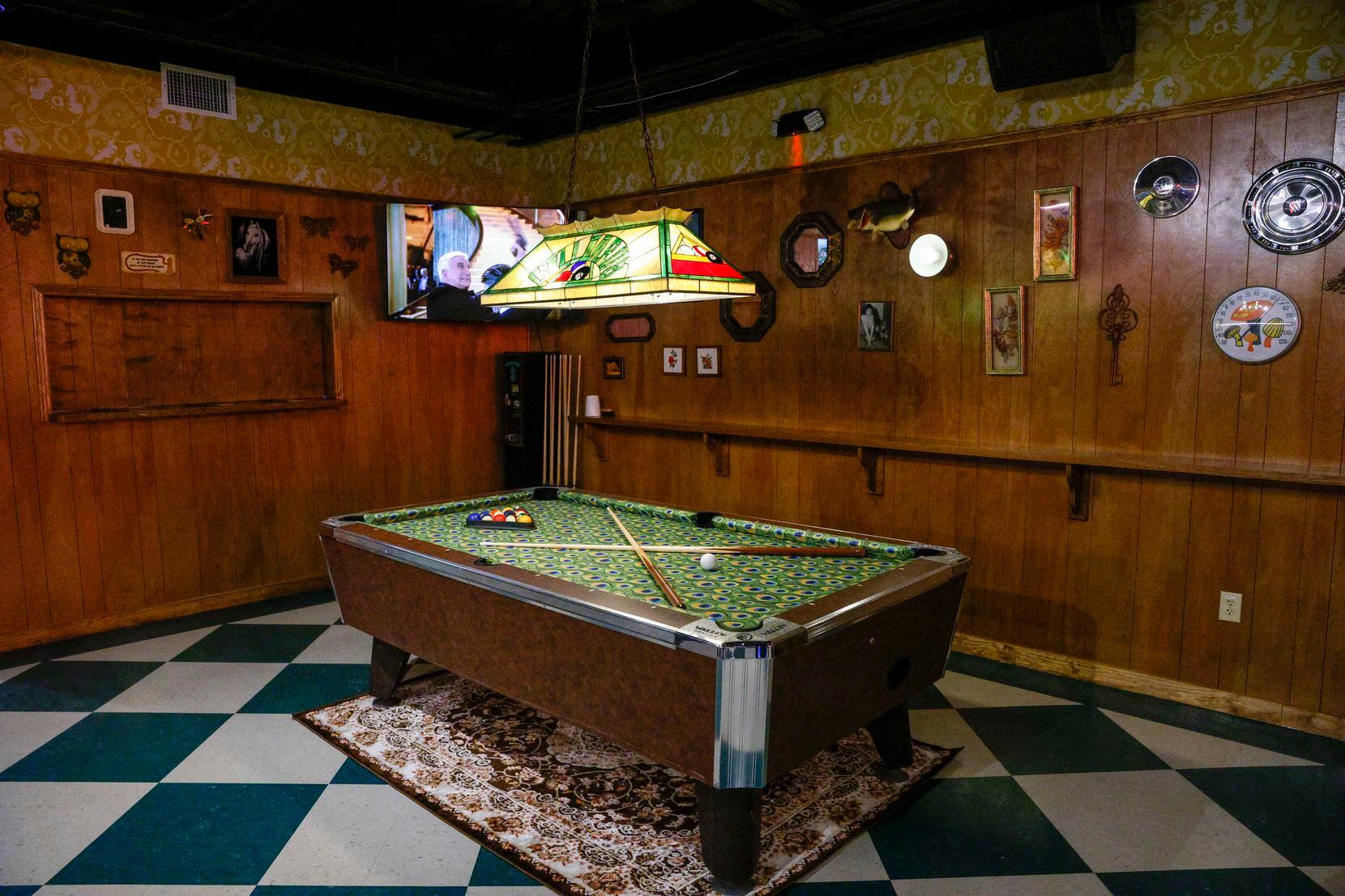 The pool table is made with peacock felt at Double D's in the Dallas Design District.