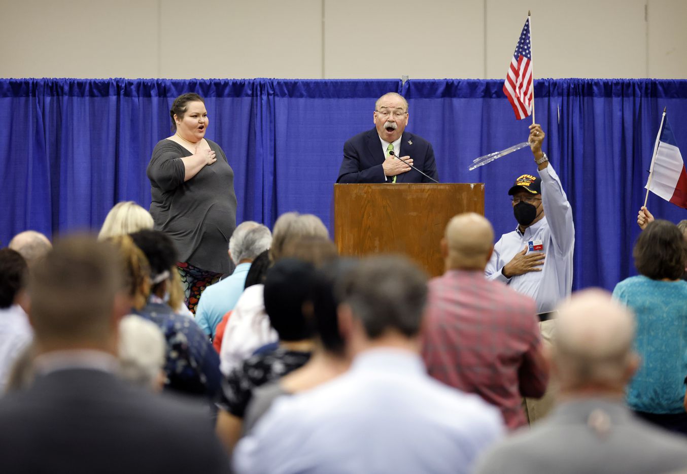 Texas Democratic Party Chairman Roberto Hinojosa (center) leads the SDEC (State Democratic...