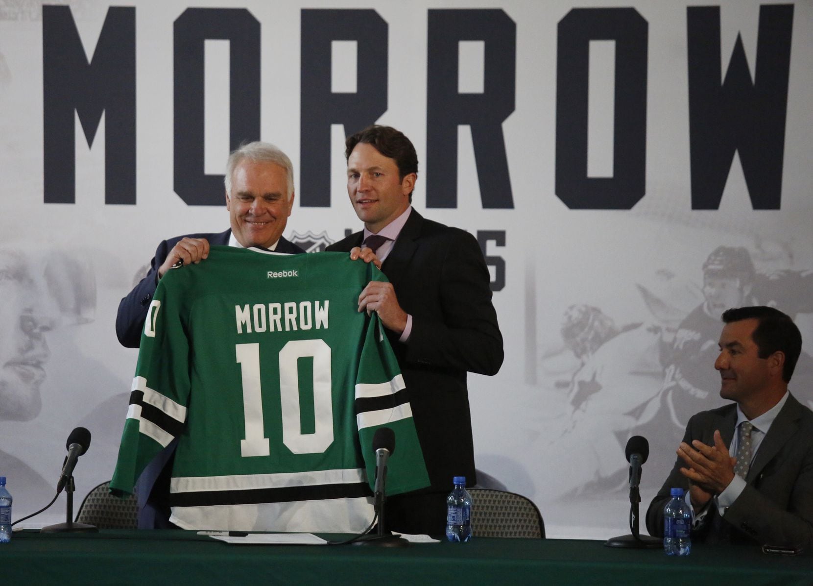Dallas Stars president Jim Lites , left, poses with Brenden Morrow with a #10 jersey as...