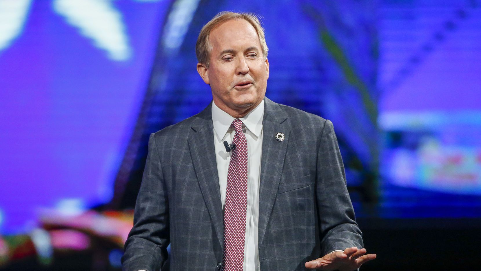 Texas Attorney General Ken Paxton gives remarks at the Conservative Political Action Conference on Sunday, July 11, 2021, in Dallas. (Elias Valverde II/The Dallas Morning News)