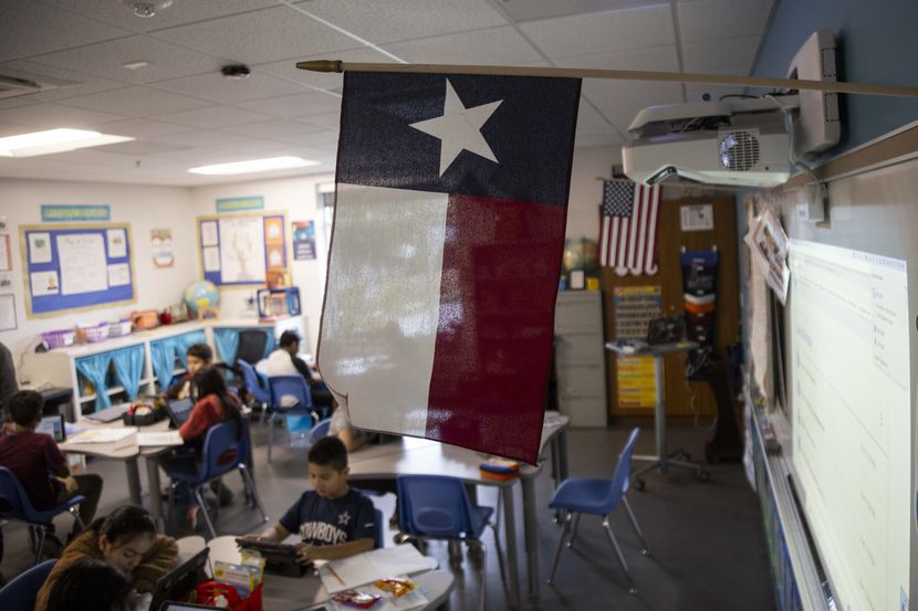A Texas and American flag in fifth grade teacher Mr. Mejicanos classroom at the Bowie Fine...