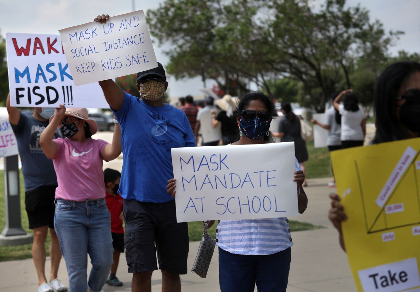 Community members seeking better COVID-19 protections gather during a protest at the Frisco ISD Administration Building in Frisco, TX, on Aug. 26, 2021.  (Jason Janik/Special Contributor)