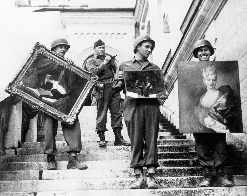  American GIs [ the monuments men ] hand-carried paintings down the steps of the...