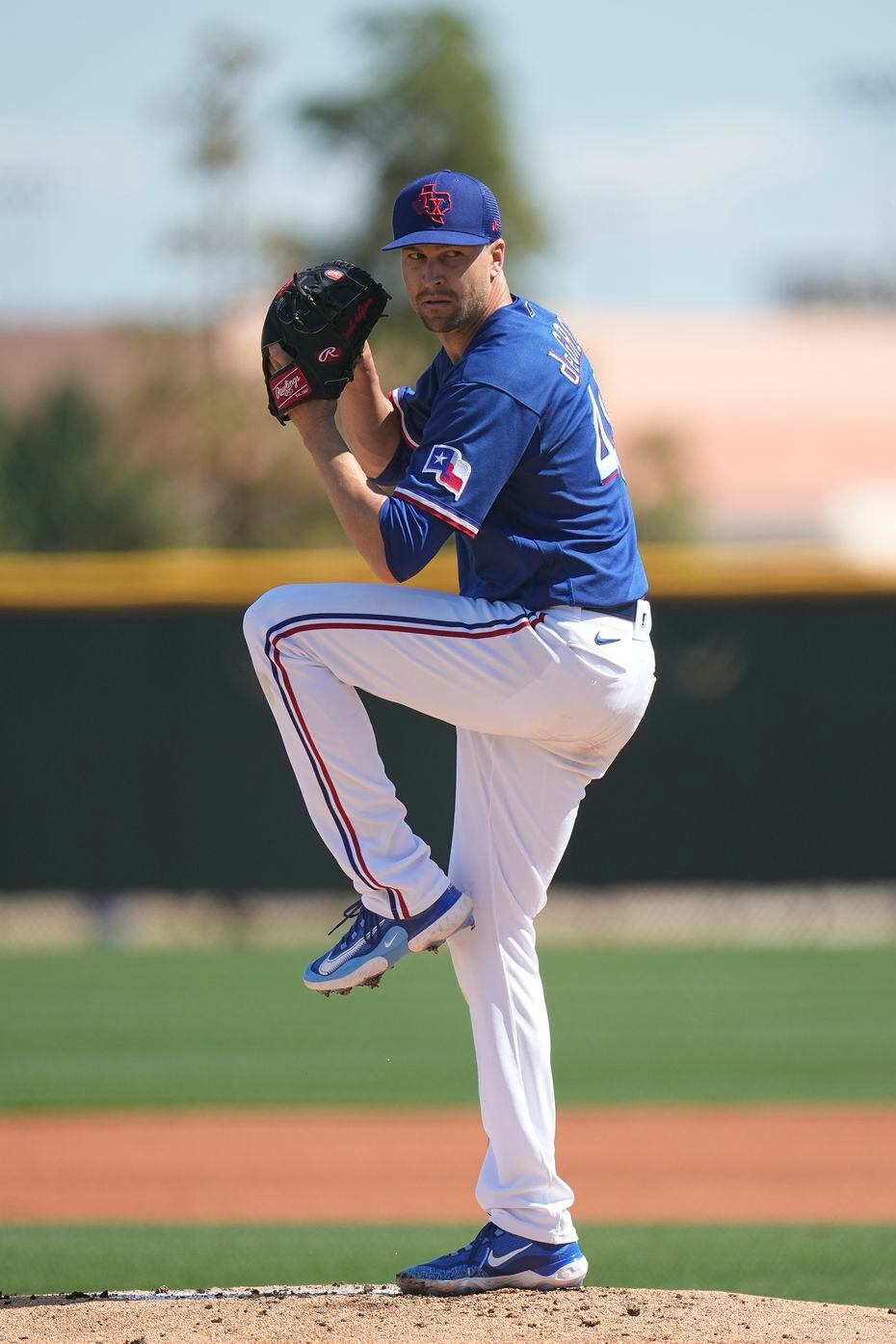 Texas Rangers' Jacob deGrom delivers during the first inning of a AA baseball rehabilitation...