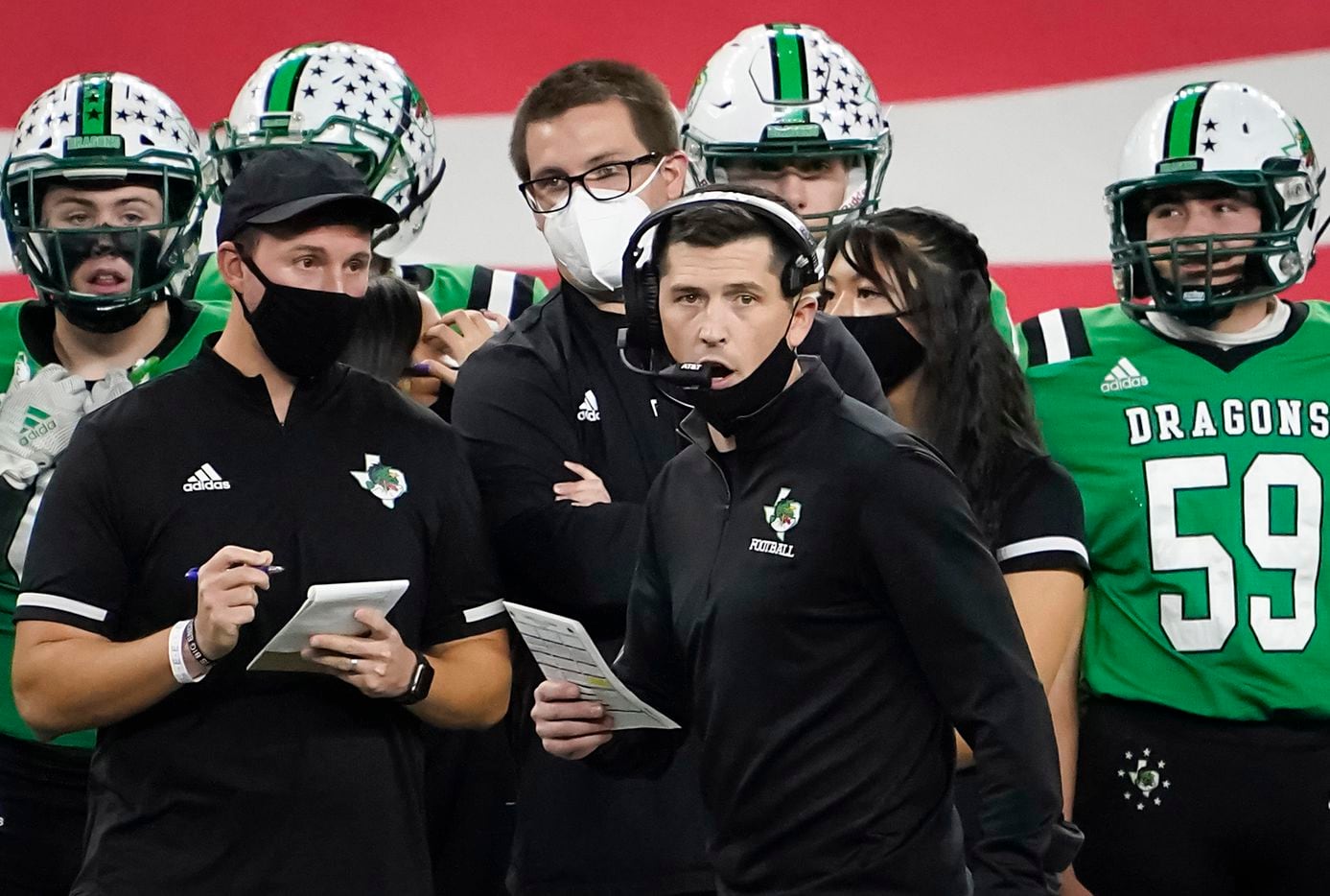 Southlake Carroll head coach Riley Dodge calls in a play during the first quarter of the Class 6A Division I state football championship game against Austin Westlake at AT&T Stadium on Saturday, Jan. 16, 2021, in Arlington, Texas. (Smiley N. Pool/The Dallas Morning News)
